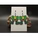 Cute machine embroidered earrings -elf legs and green boots with a green bow with a yellow buckle as the body. Black hypoallergenic hooks.